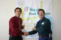 Bill receives his workshop certificate.