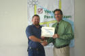 Dennis receives his class certificate