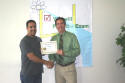 Juan receives his class certificate