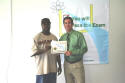 Jabari receives his class certificate
