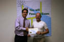 Thomas receives his workshop certificate.